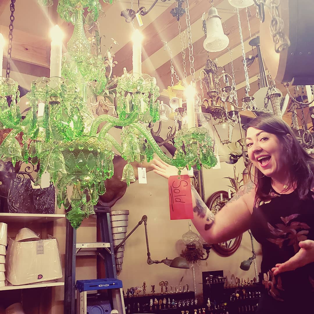 Bright green crystal chandelier with sold tag